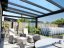 Pergola RAL 9005 s boční výplní, posuvnými stěnami a LED osvětlením